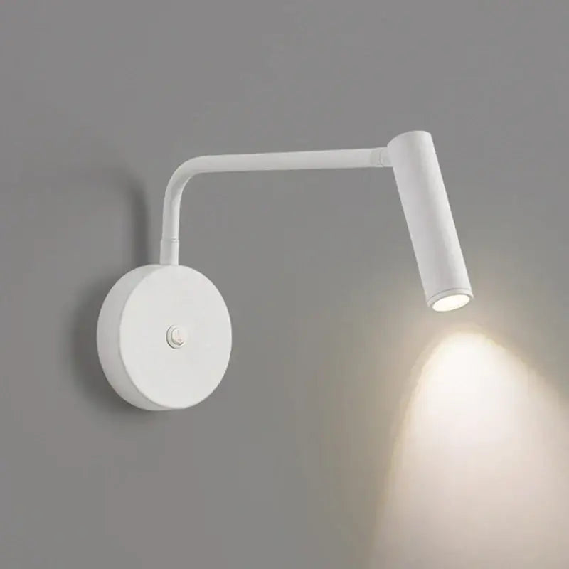 Modern black and white led wall lamp with a sleek curved arm and cylindrical light head by decorbites wall lamp