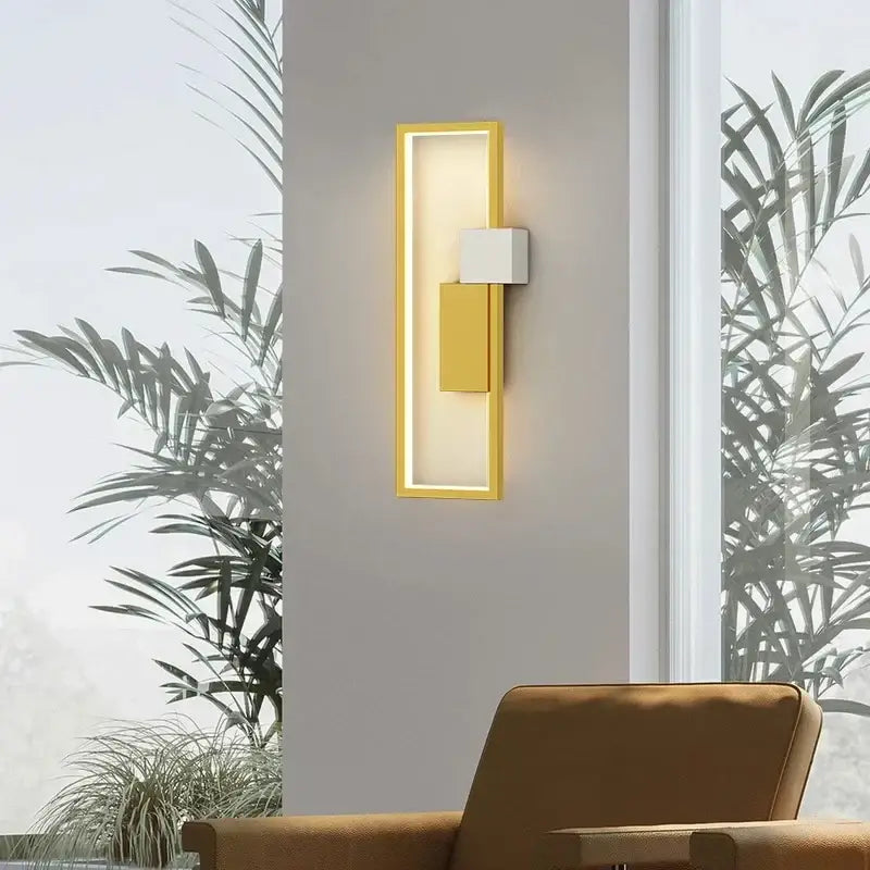 Modern black and white led wall lamp with gold frame and rectangular illuminated panel for minimalist bedroom use