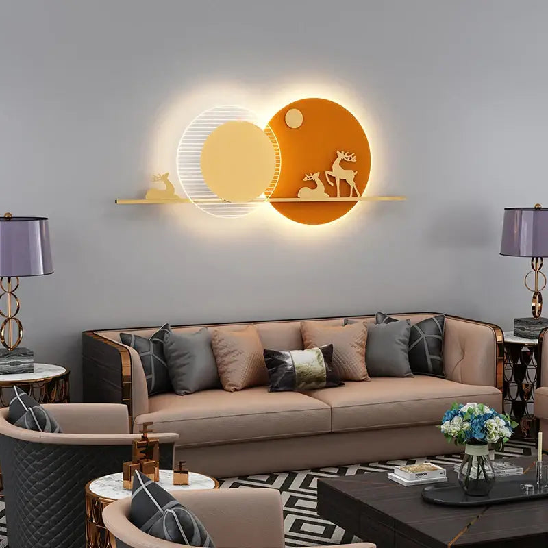 Modern black and white led wall lamps featuring illuminated circular light panels with gold-toned deer silhouettes