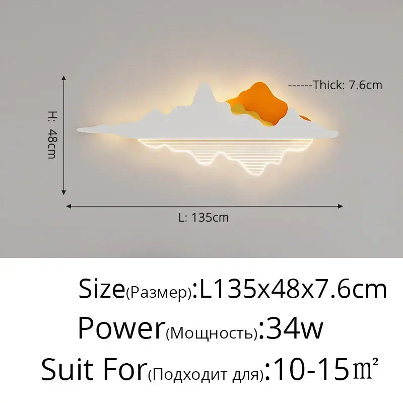 Modern black and white led wall lamp with mountain-shaped white and orange acrylic design emitting warm light