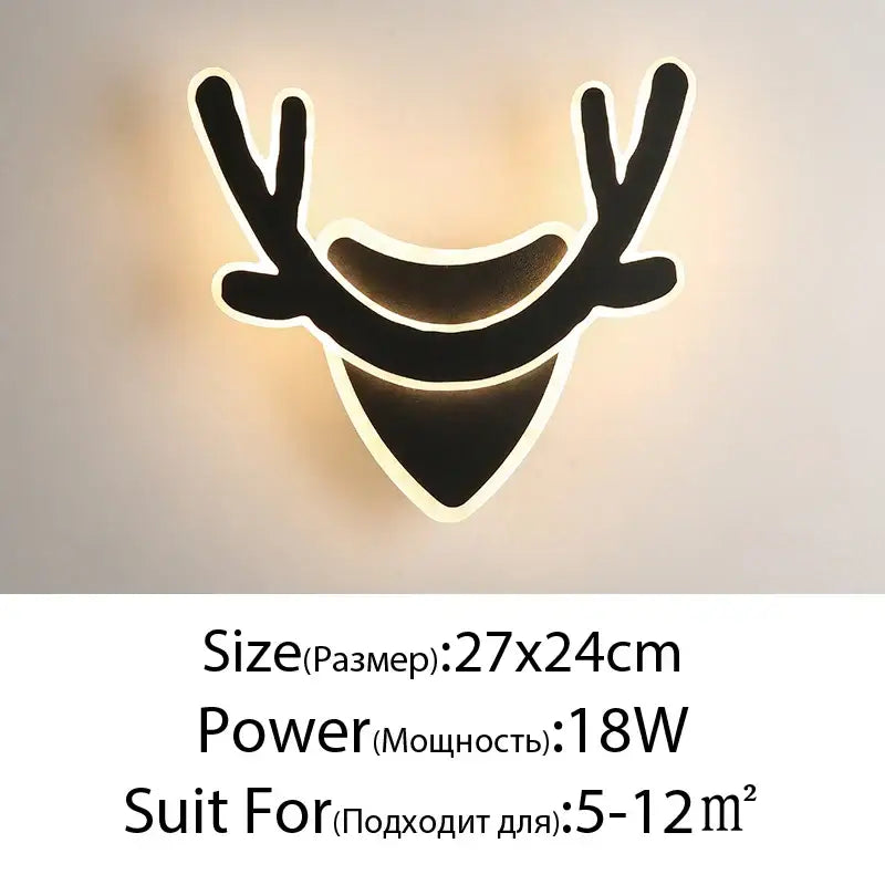 Modern black deer head led wall lamp with glowing white edges sculptural design ideal for bedroom wall lamps