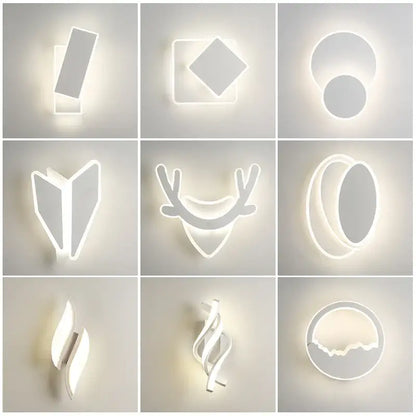 Modern black and white led wall lamps in sleek white acrylic with geometric and nature-inspired designs for bedroom