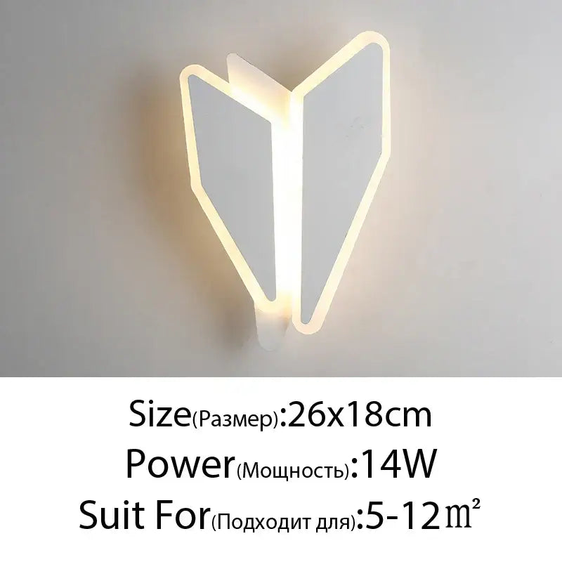 Modern white led wall lamps with sleek angular paper airplane design for bedroom sculptural spin style wall lamps