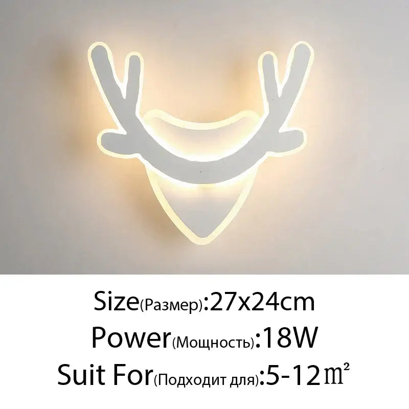 White led wall lamps shaped like a deer head with glowing antlers for modern bedroom sculptural spin design wall lamps