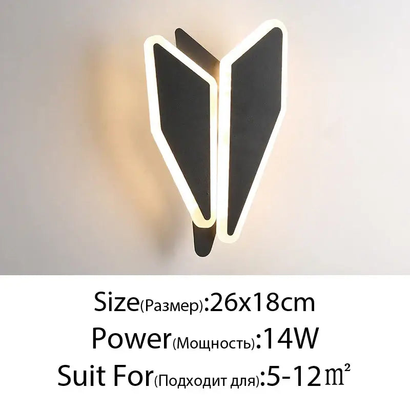 Modern black and white led wall lamps with a sleek angular design resembling overlapping wings for bedroom use