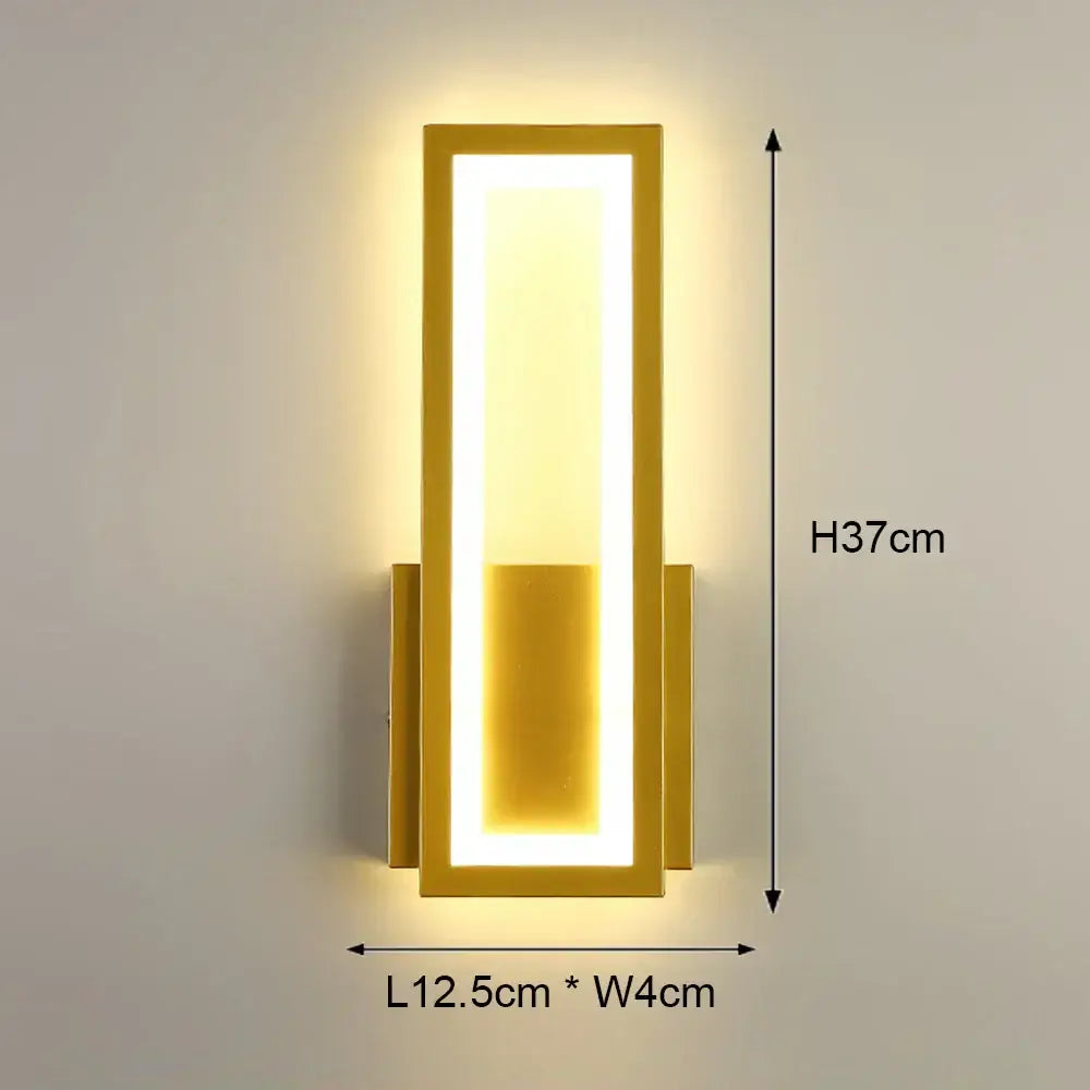 Gold-finished rectangular led wall light with glowing led strip for modern black and white bedroom geometric sconce