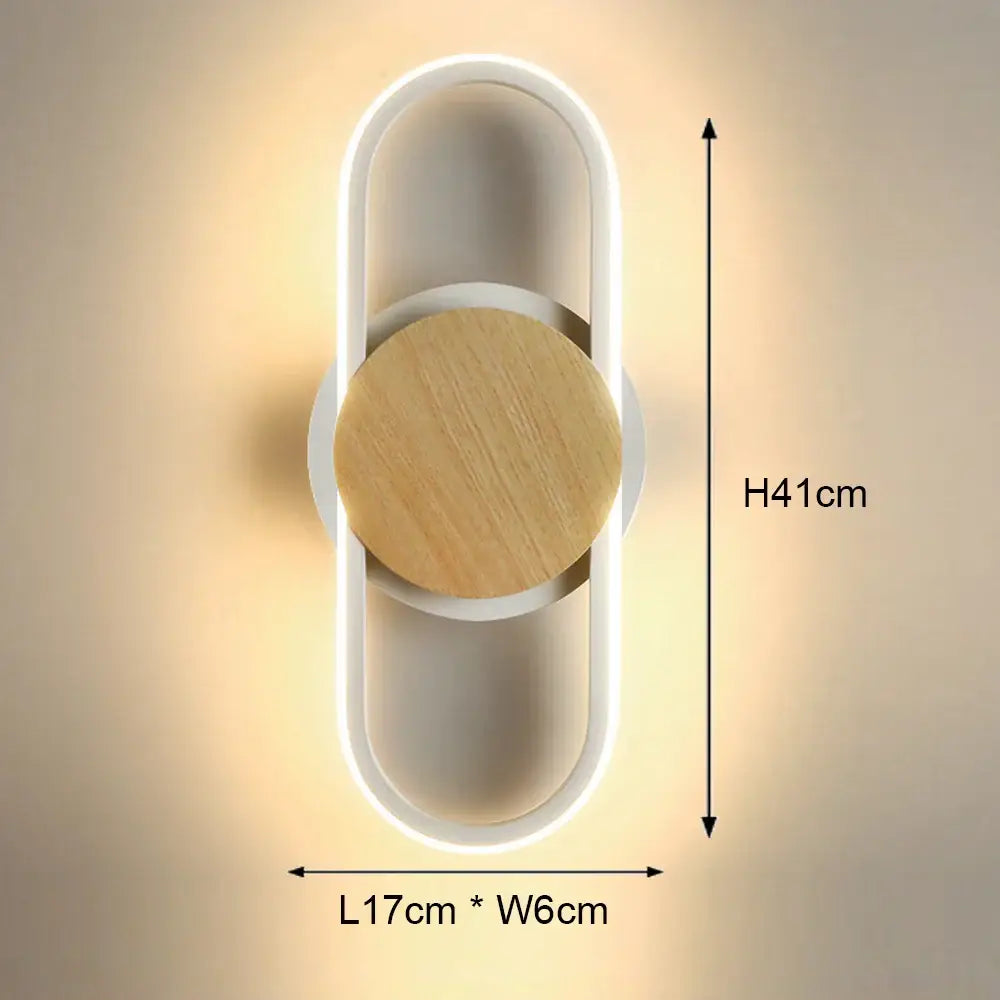 Modern black and white led wall light with oval white and light wood sconce featuring a sleek minimalist design