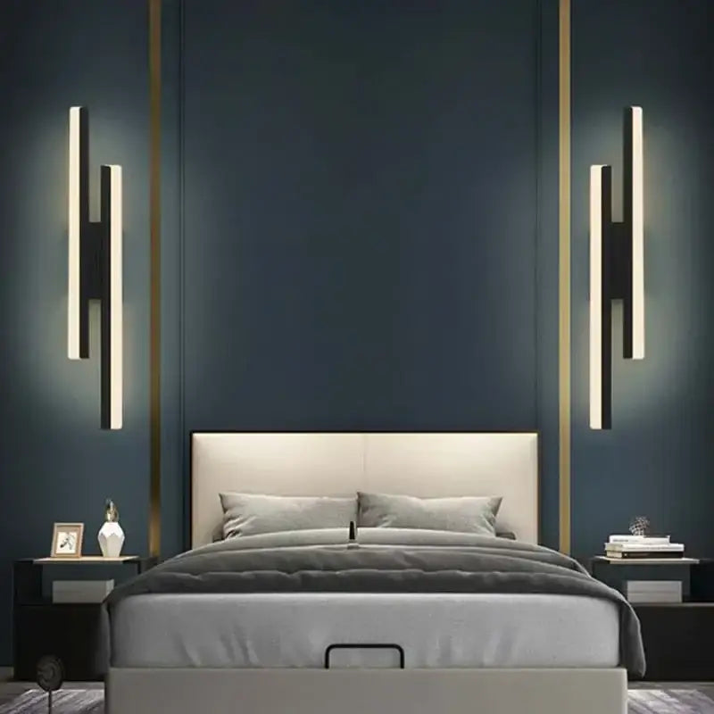 Modern black and white led wall sconce lamp with sleek vertical led strips and black frame mounted beside bed
