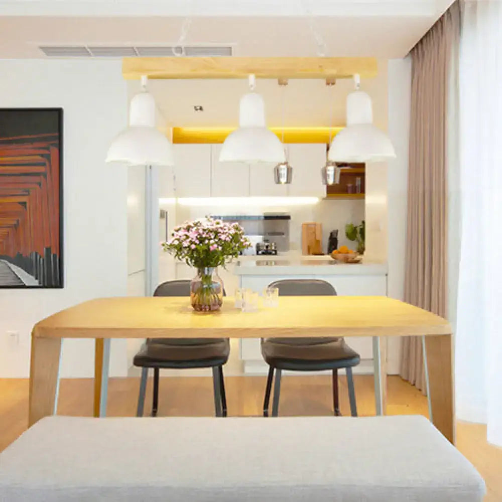 Decorbites™ modern dome island lighting with black white metal pendant lights above a light wood dining table with pink flowers