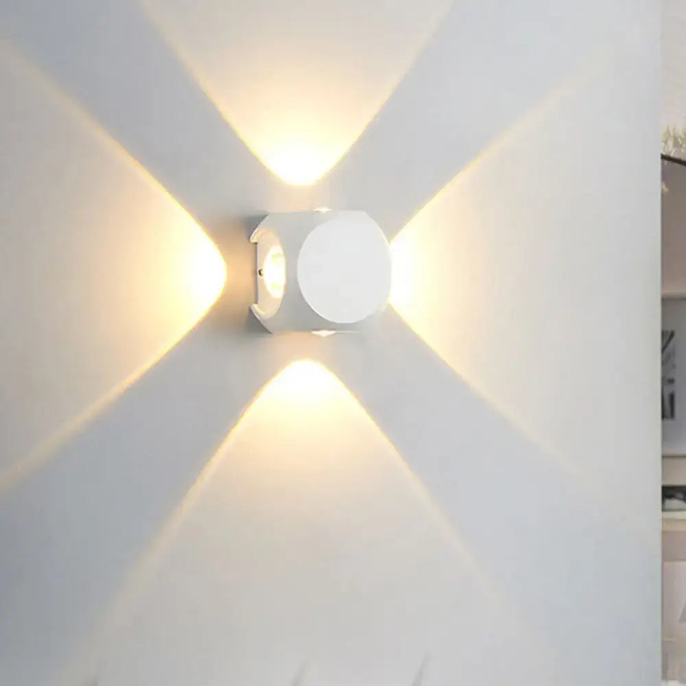 Modern black and white mini cube wall lamp with white geometric sconce and four directional light beams for living room