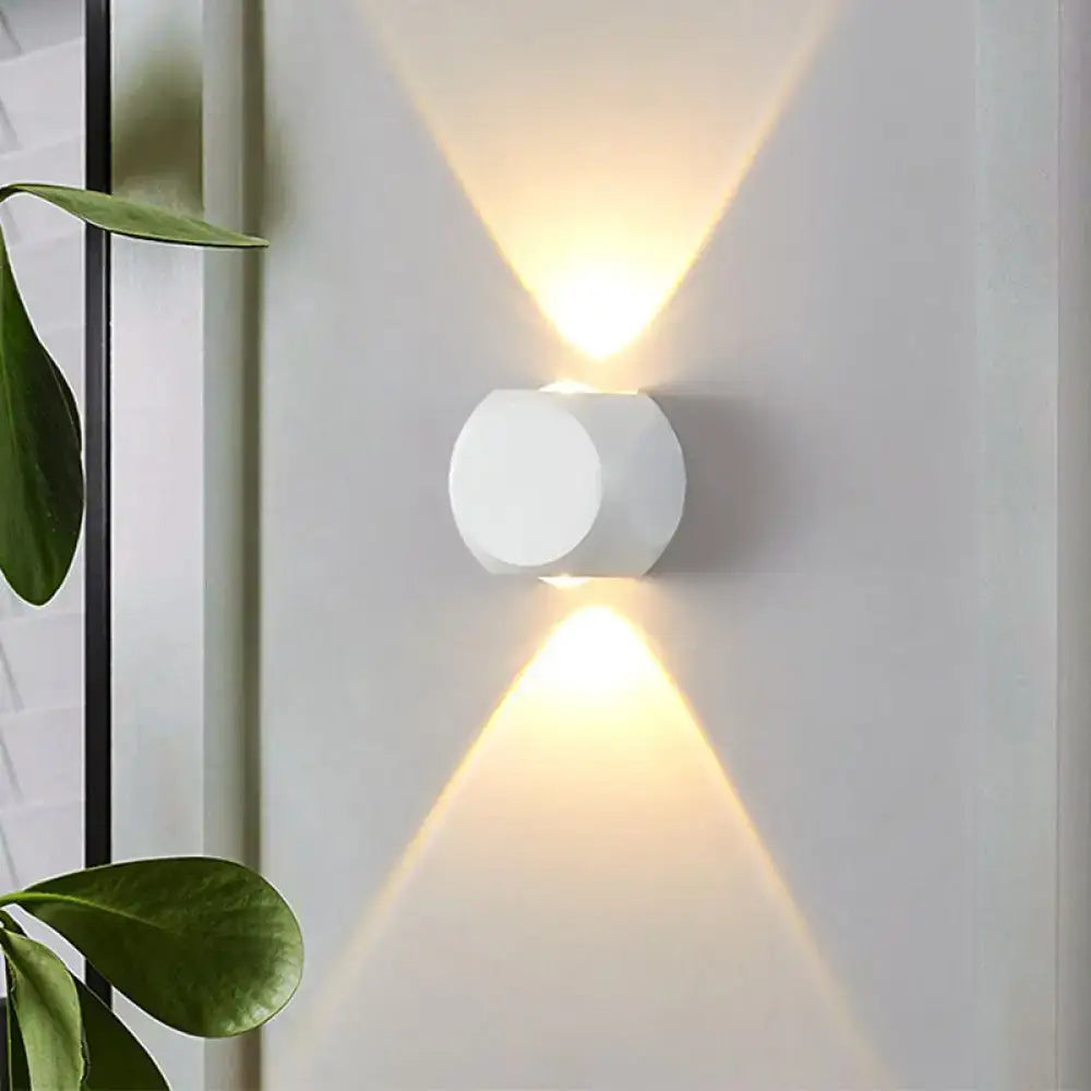 White hexagonal mini cube wall lamp with warm directional lighting for modern living room wall sconce design