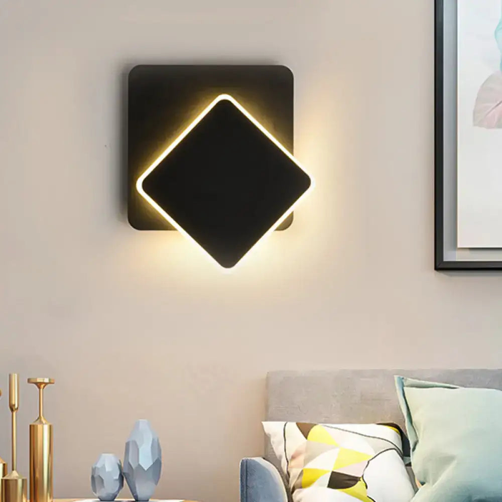 Modern black square wall lamp with glowing diamond-shaped led light frame for minimalist bedroom sconce