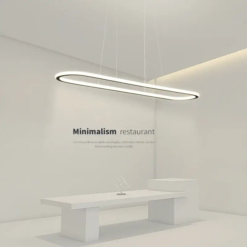 Modern black and white oval led chandelier with sleek elongated oval design and clean white finish for dining room