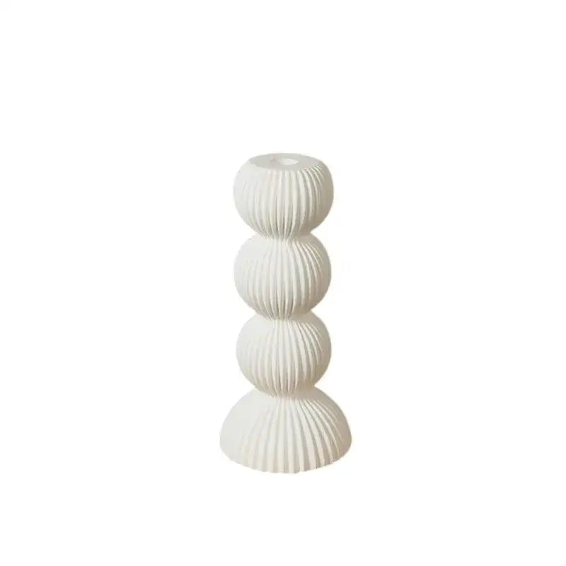 White ceramic candle holder with stacked ribbed spherical segments modern decorbites geometric ceramic candle design
