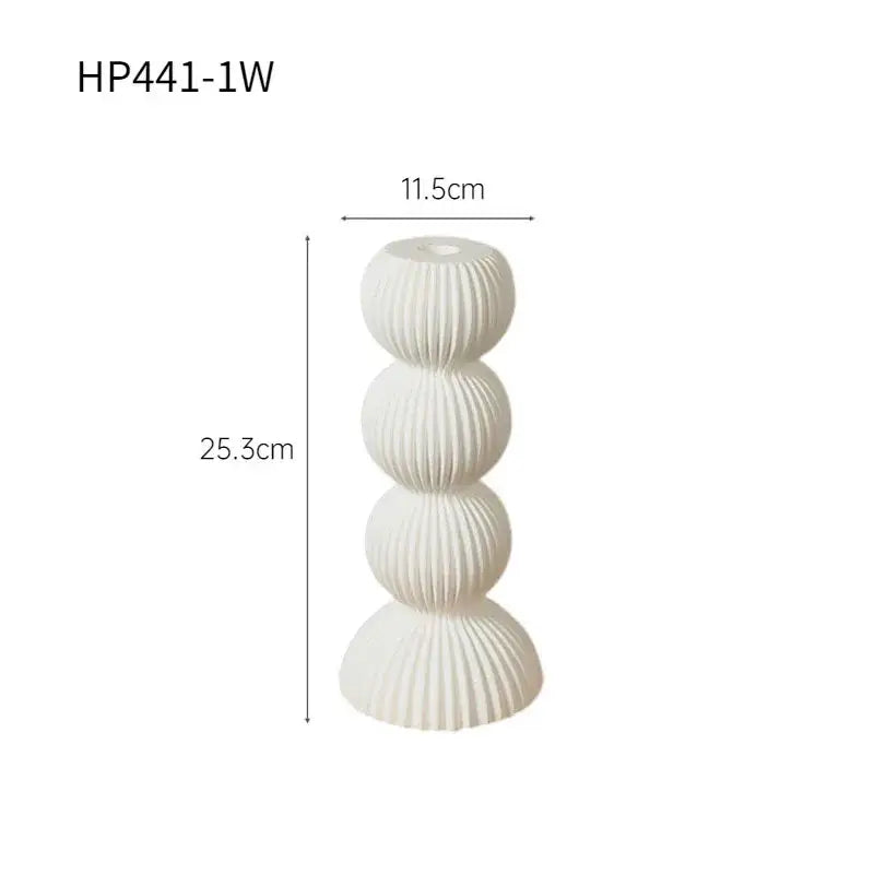 Modern black and white ribbed geometric ceramic candle holder with stacked spherical sections for living room decorbites decor