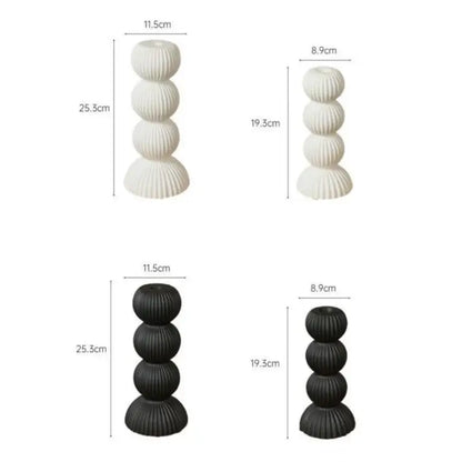 Modern black and white ribbed geometric ceramic candle holder featuring stacked spherical segments for living room decorbites geometric ceramic decor