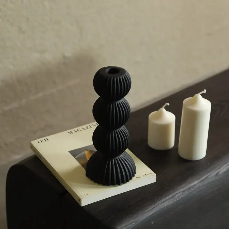 Modern black ribbed geometric ceramic candle holder with stacked spherical tiers for living room decorbites decor