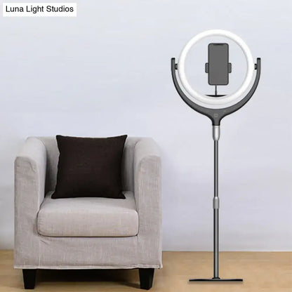 Modern black and white led mirror lamp ring light with phone stand featuring white illuminated circle on black base