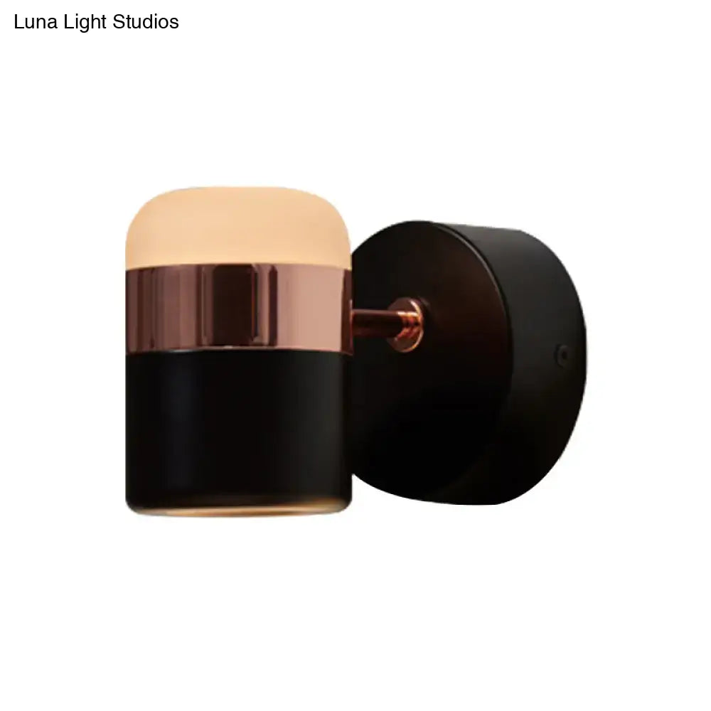 Modern black white rotatable led spotlight bedroom wall sconce with sleek black and rose gold cylindrical warm glow lampshade