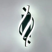 Modern black and white sculptural led wall lamps with sleek intertwined design for bedroom lighting