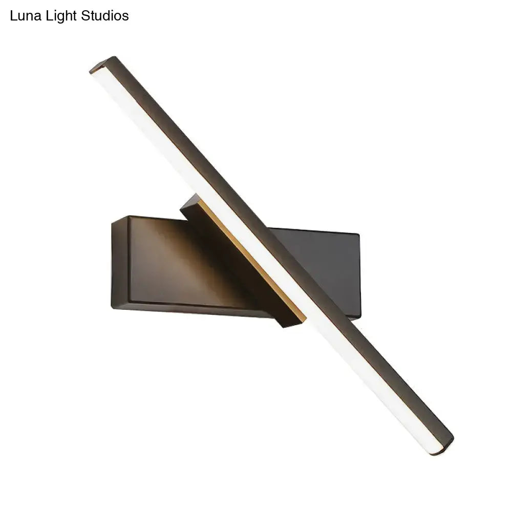 Modern black and white slim led wall sconce with a black matte finish and sleek angular design for bedroom lighting
