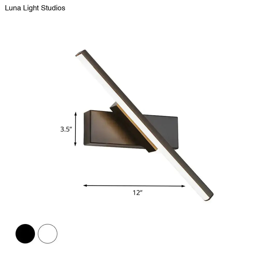 Modern black and white slim led wall sconce with sleek angular matte black and brushed brass rectangular bars for bedroom lighting