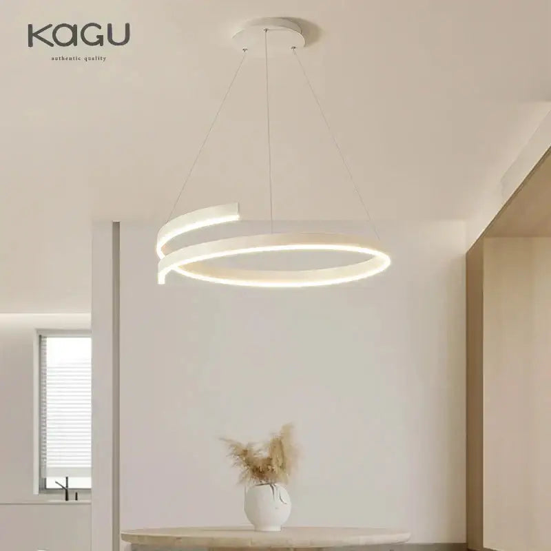 Modern white kagu pendant light with sleek overlapping rings in black white spiral chandelier for decorbites black white decor