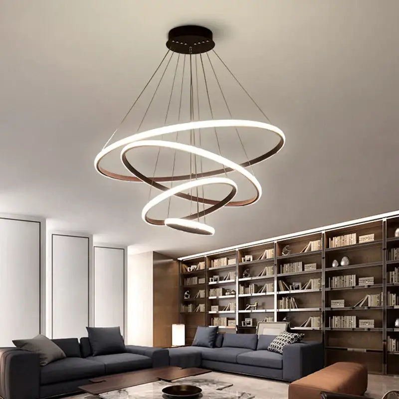 Modern black and white pendant chandelier featuring a spiral design with three interlocking rings decorbites black ring style