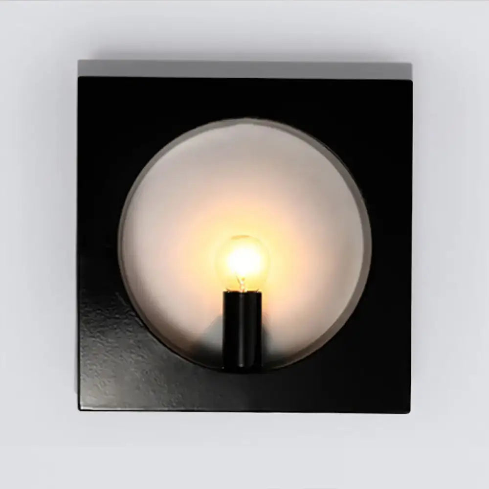Modern black and white square wall lamp with frosted glass globe and medium base exposed bulb in a inches fixture