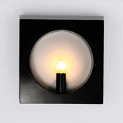 Modern black and white square wall lamp with frosted glass globe and medium base exposed bulb in a inches fixture