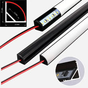 Modern black and white tube bar light with sleek rectangular design featuring exposed red wiring decorbites led black strip light
