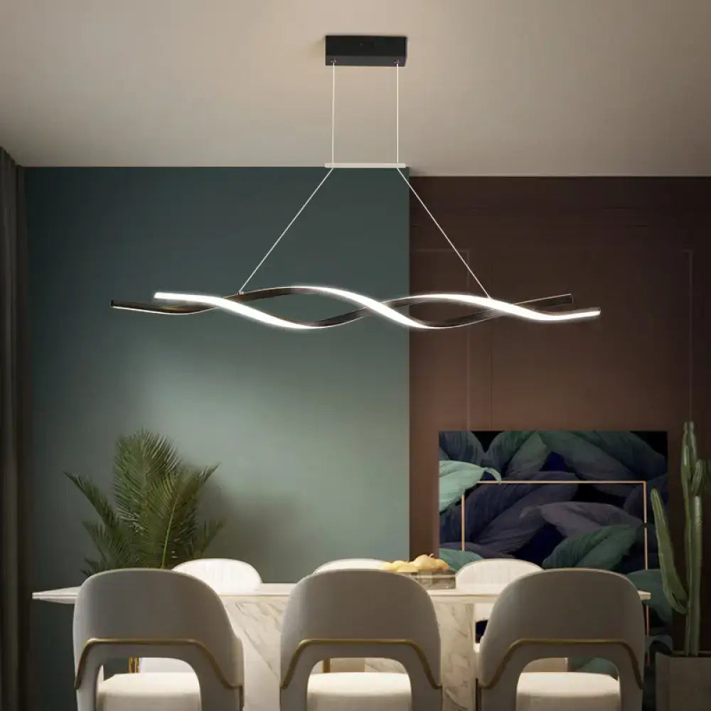 Modern black and white twisted led pendant light with sleek wave design for kitchen island lighting