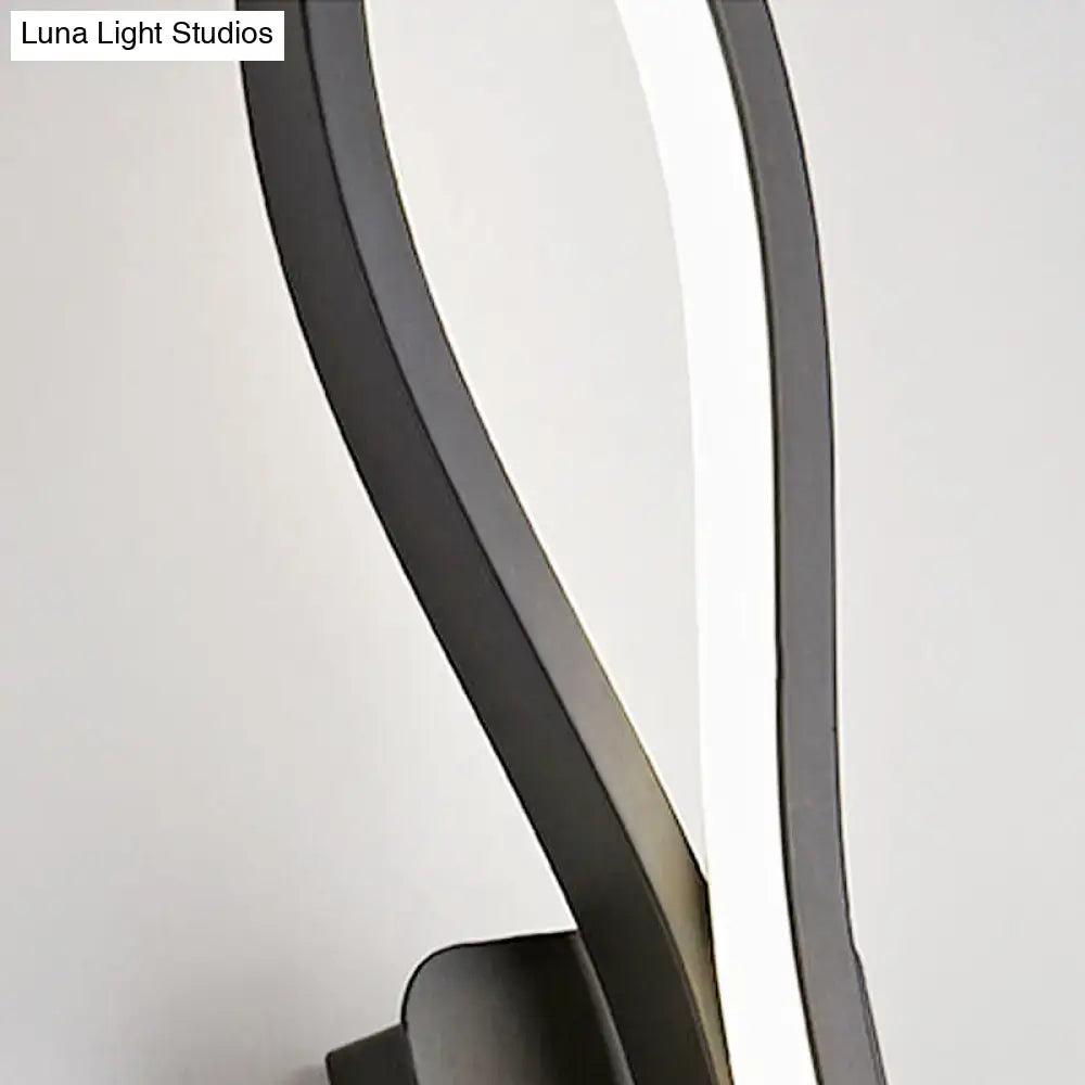Modern black and white twisted wall light sconce with sleek curved design and integrated led strip for 110v-120v use
