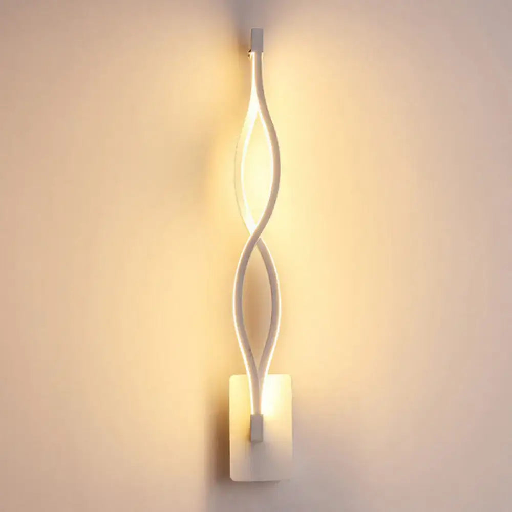 Modern black and white twisted wall light sconce with sleek design and warm ambient lighting for 110v-120v use