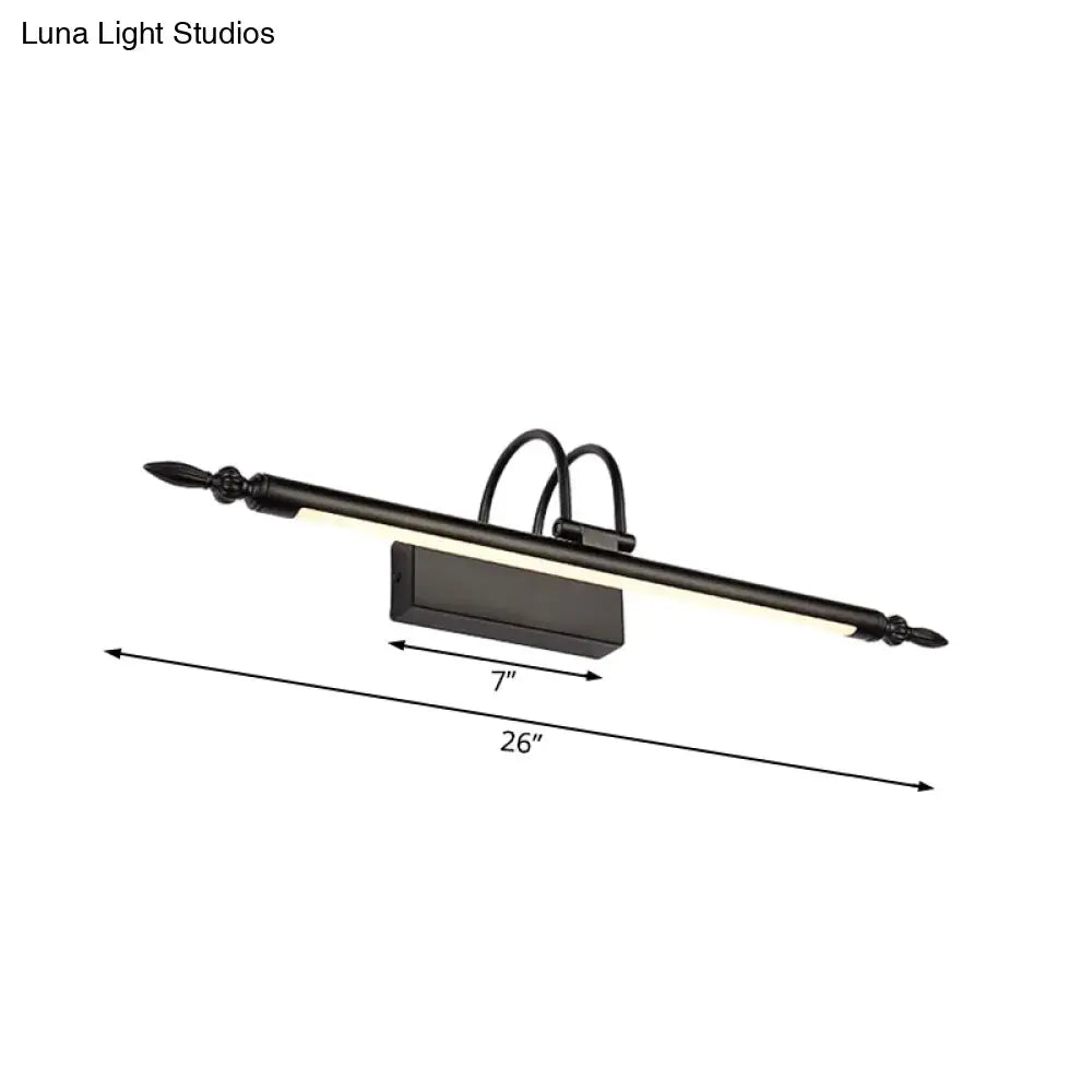 Black wrought iron vanity lighting with decorative finials featuring modern white warm light for bathroom use