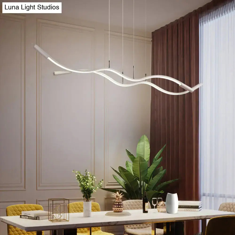 Modern white aluminum wave shaped pendant lamp with sleek flowing design for minimalistic dining room lighting