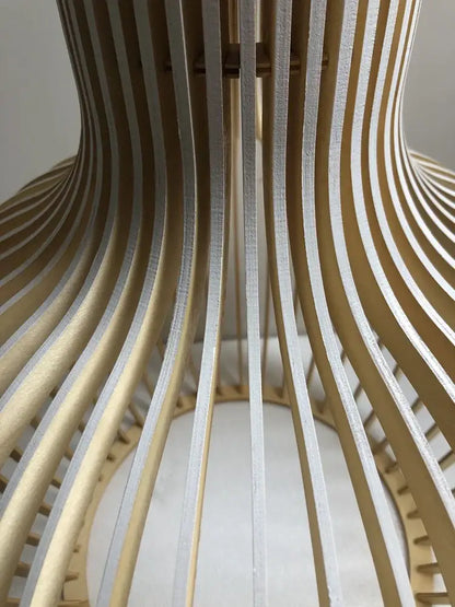 Modern black and white wood cage pendant light with curved natural finish white wood slats for living room