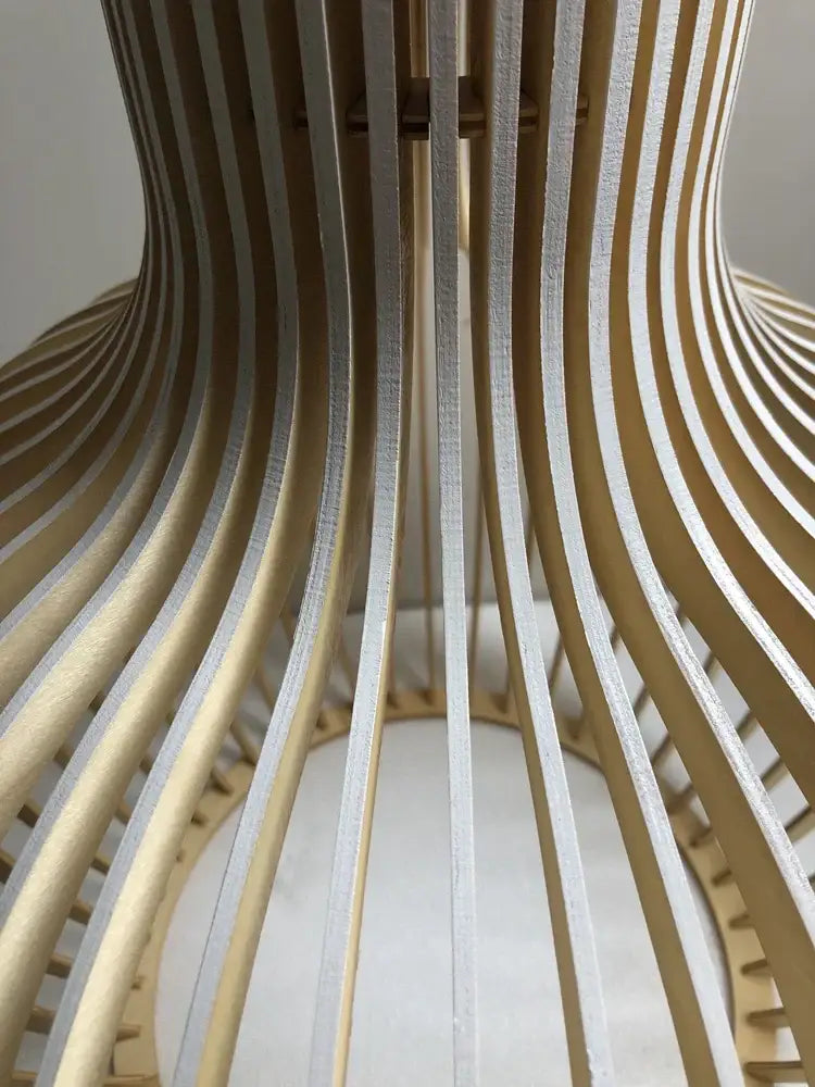 Modern black and white wood cage pendant light with curved natural finish white wood slats for living room