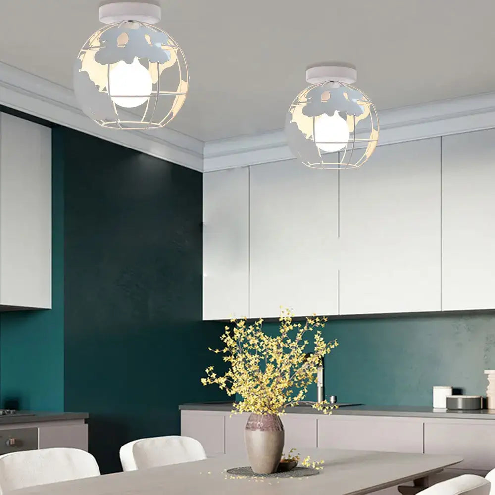 Modern black and white world map globe ceiling light shade featuring white wireframe design with cut-out map pattern