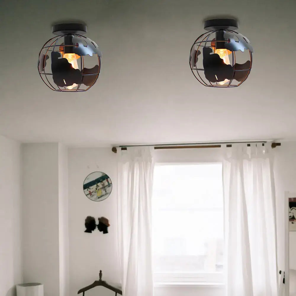 Modern black and white world map globe ceiling light shade with industrial black metal frame and wire mesh detailing