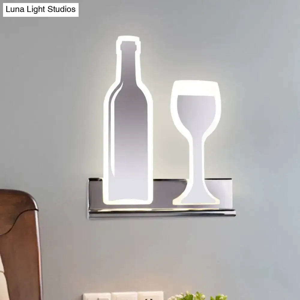 Modern black wine sconce light with chrome finish featuring illuminated bottle and wine glass silhouettes fixture height