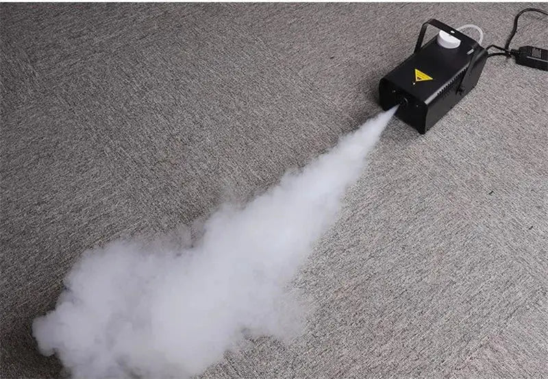 Modern black wireless fog machine pump emitting thick white smoke for living room party stage use
