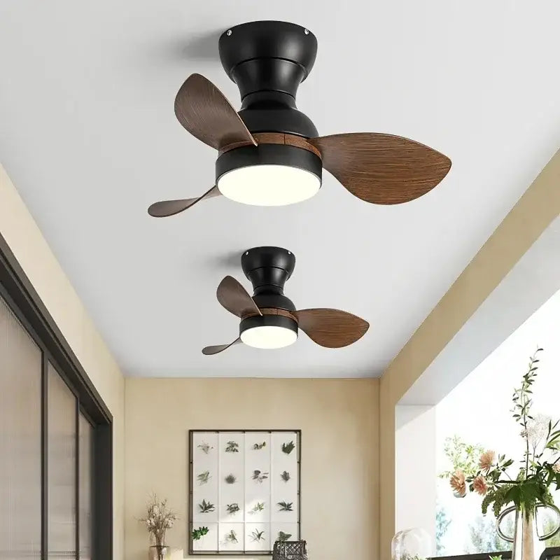Modern black ceiling fan with wood finish blades and integrated led light for bedroom use