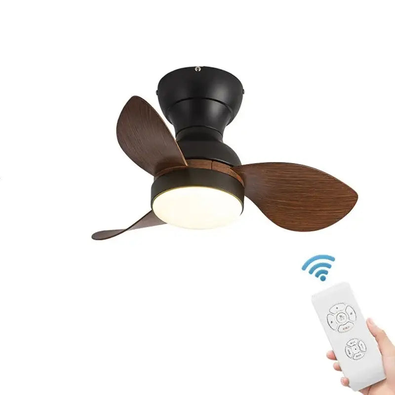 Modern black ceiling fan with wood finish and led light shown with white remote control for bedroom use