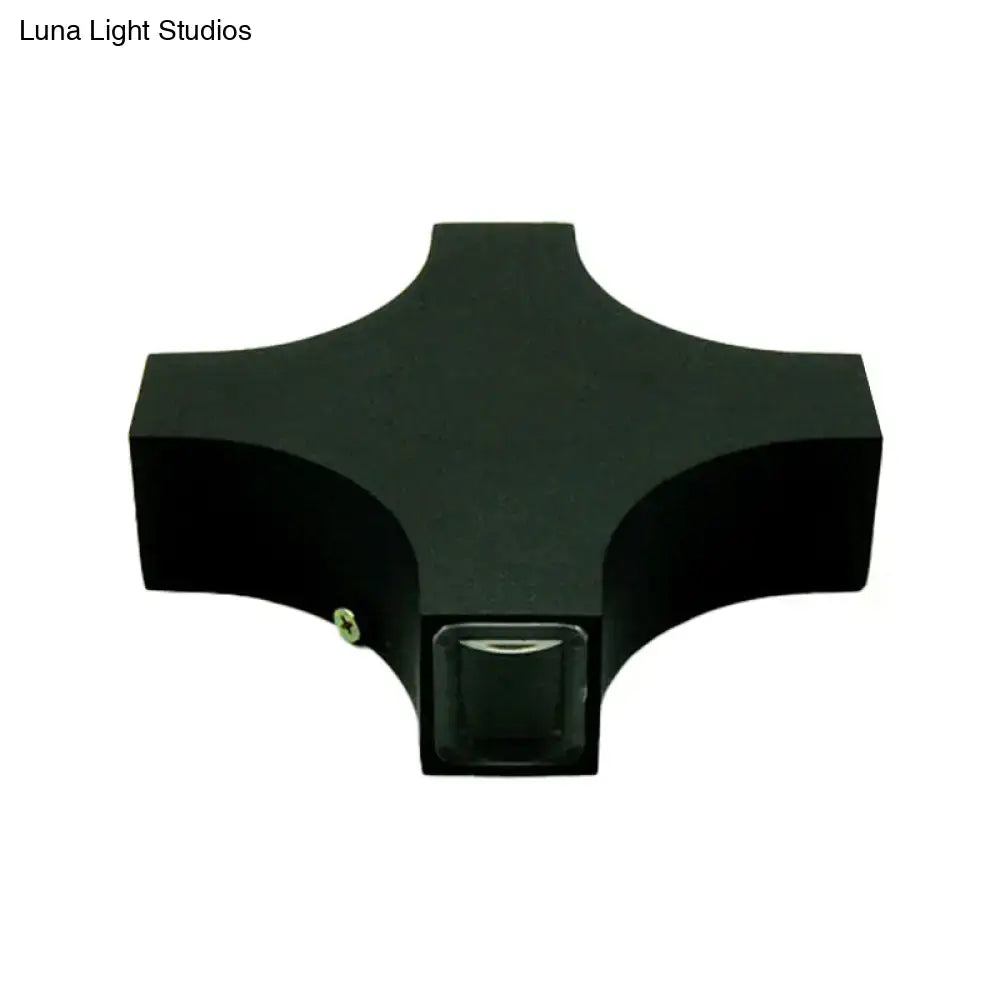 Modern black x shaped wall mount lamp with matte finish and central glass panel featuring rgb color led lighting