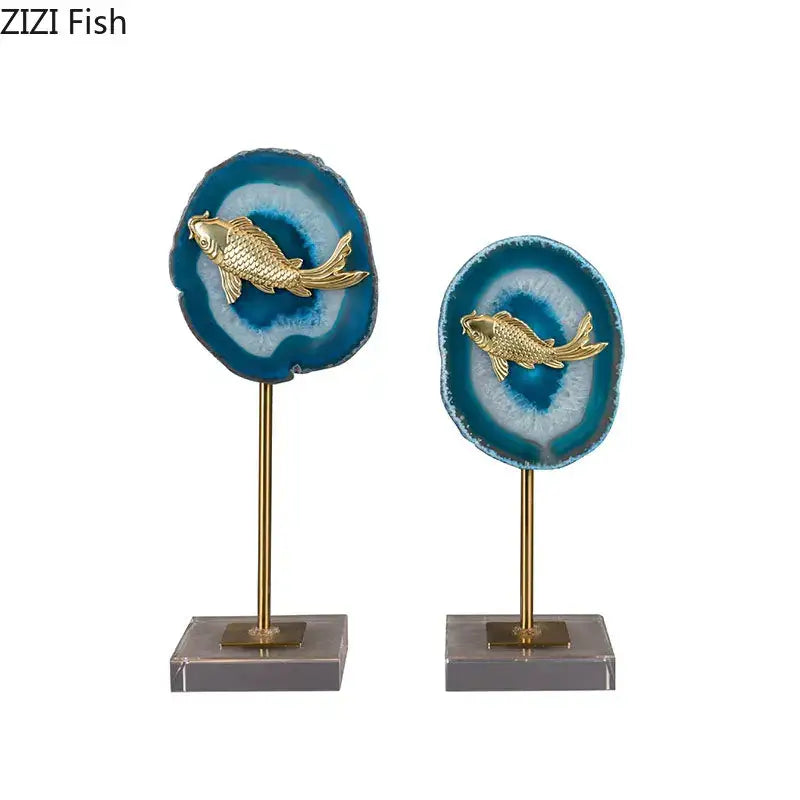 Elegant gold koi fish sculptures mounted on blue and white agate slices with brass stands for modern decorbites blue agate decor