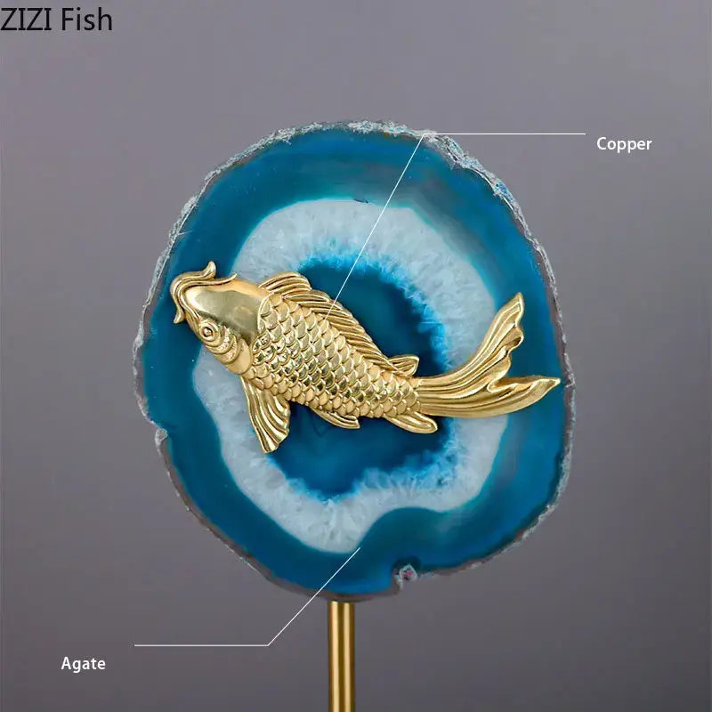 Modern blue agate and golden fish statue featuring a gold koi fish ornament on vibrant blue and white decorbites blue agate