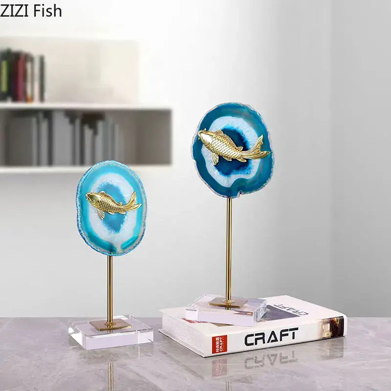 Modern blue agate slice decorative pieces with golden fish sculptures on brass stands for elegant living room decorbites blue agate