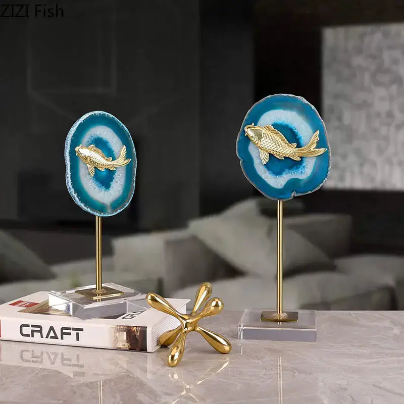 Modern blue agate slice decorative stand with golden fish figurine for stylish living room decor by decorbites blue agate