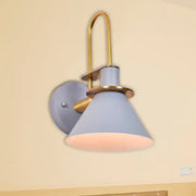 Modern blue and brass pyramid wall sconce with e26 e27 light socket featuring a sleek curved brass arm and light blue shade